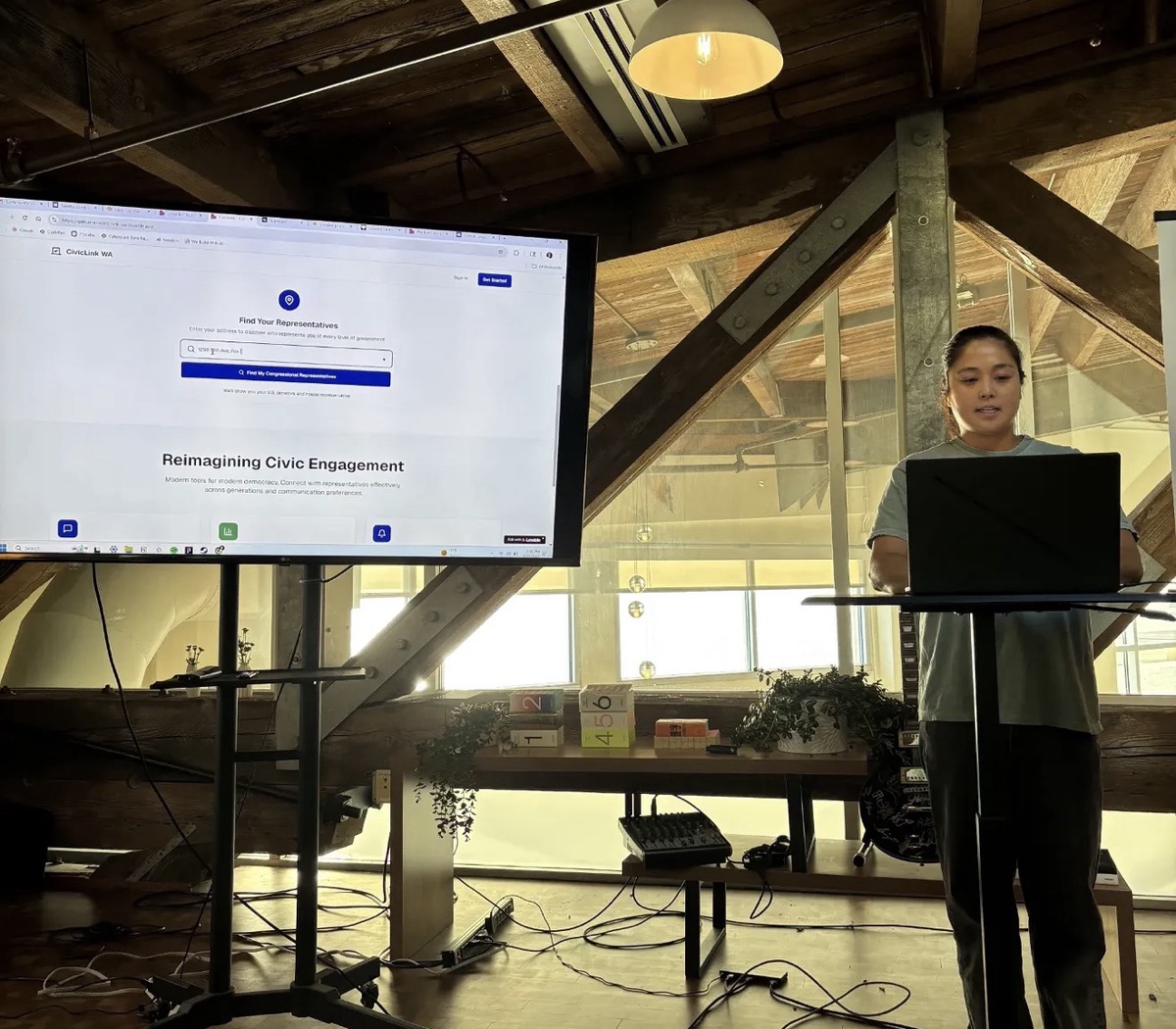 Kate presenting CivicLink at the Lovable hackathon.